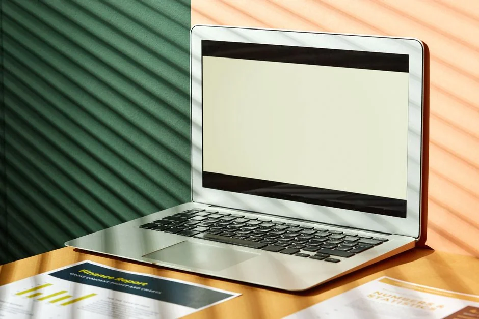 Close-up shot of a laptop displaying the Pexels login screen against a blurred backdrop, giving the scene a moody tech feel.